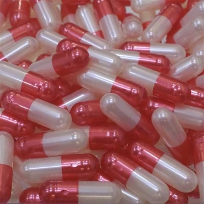 Capsúil Pill Bán